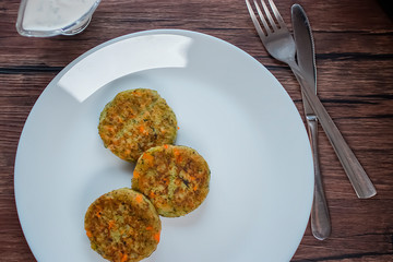 Vegetable patties on a white plate. Vegetarian food.