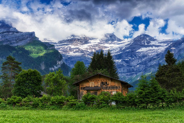 Fototapeta na wymiar Swiss house in the mountains