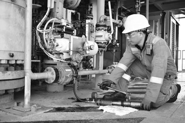 Fototapeta na wymiar Mecahnical technician,Oil and gas offshore platform. Asia 2019.