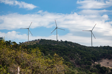 wind turbines on blue sky