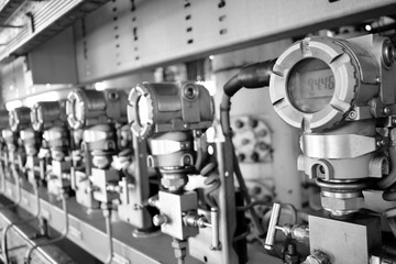 Pressure transmitter to monitor downstream pressure, Black and white.
