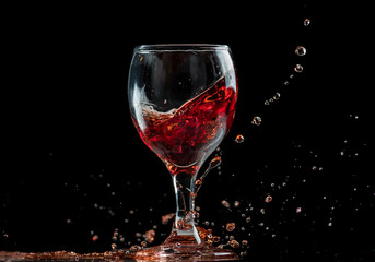 splash and flow from red wine in a glass, speed freeze