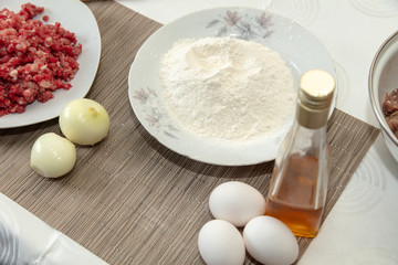 Stuffing and flour in the kitchen for meatballs