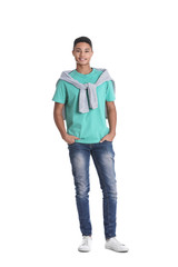 Portrait of African-American teenage boy on white background