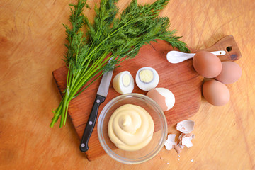 Deviled eggs with greens and pickles
