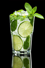 Mojito cocktail on black background