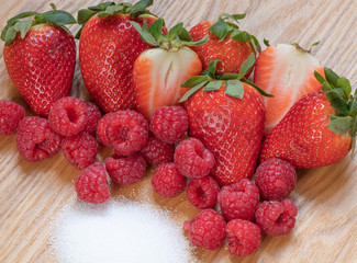 Strawberry And Raspberry Fruits. Sugar. Raw. Macro. Red