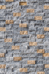 Stone brick masonry. Vertical background texture.