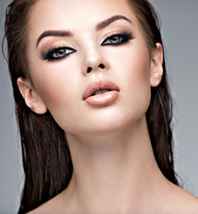 Fototapeta premium Beauty face of the young beautiful woman