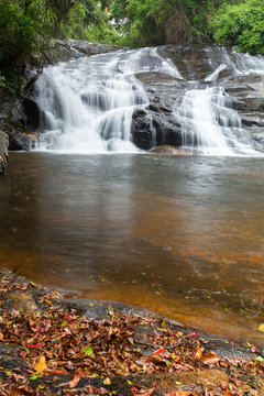 River flowing over rocks and the Debengeni Waterfall