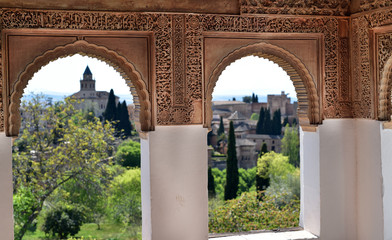 Scenic view of Alhambra framed by the Moorish style keyhole windows, Granada, Andalucia, Spain