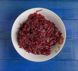 Boiled sliced beets on a plate.