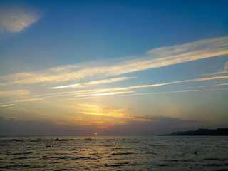 Amazing sea sunset, the sun, waves, clouds