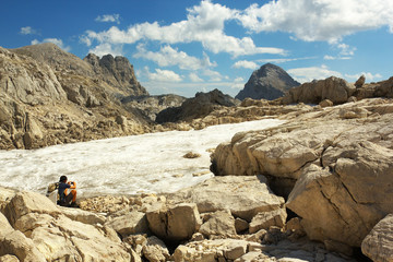 8/22/2012, Austria - Tourist watching a landscape in Totes Gebirge