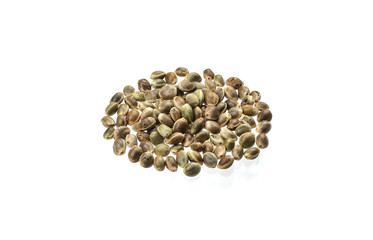 Hemp seeds isolated on white background with clipping path, close up, macro
