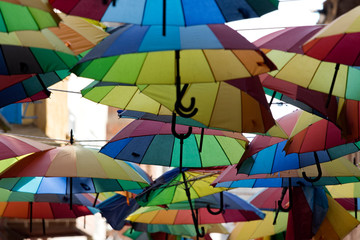 Colorful Umbrellas In The Street, abstract background