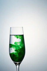Green ink in water 
