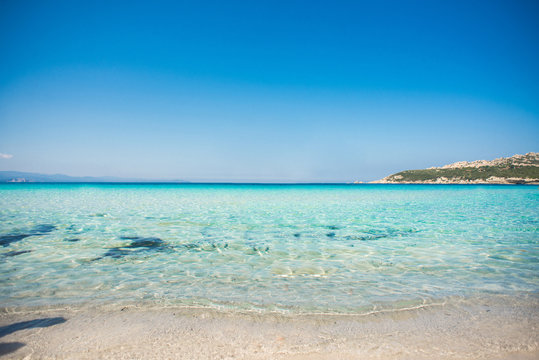 Beach of Rena di Ponente, Sardinia Island, Italy. Blue Sky.