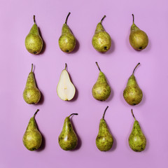 Colorful fruit pattern of fresh pears on pink background. From top view, minimal food concept