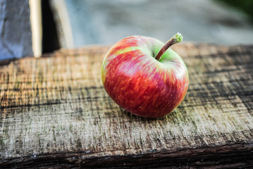 red apple on wooden background
