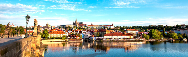 The beautiful landscape of the old town and the Hradcany (Prague Castle) with St. Vitus Cathedral...