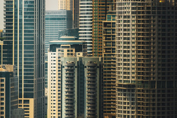 Fototapeta na wymiar Modern Office building background in Bangkok city, office towers in urban city of Thailand,Details of modern office building.
