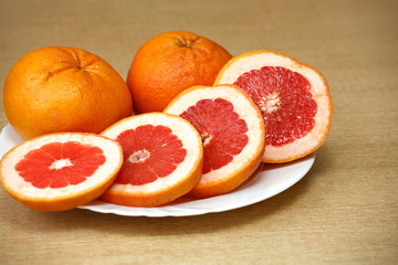Naklejka na ściany i meble grapefruit on a plate