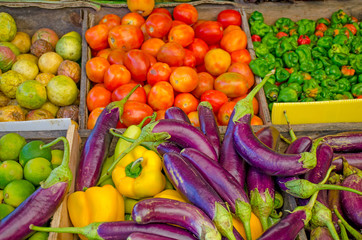 fresh vegetables on a market counter