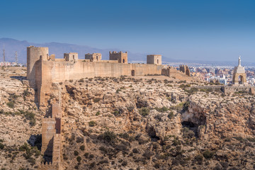 Fototapeta premium Almeria medieval castle panorama with blue sky from the air in Andalusia Spain former Arab stronghold