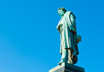 Monument to Alexander Pushkin against blue sky. Moscow. Russia