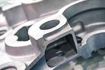 Aluminum casting. Industrial production. Fragment of aluminum products. Fragment of the engine...