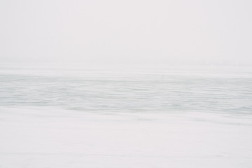 melting river and fog over it.