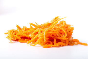 Salads from fresh carrots. Korean spicy vegetables salad in bowl on a wooden table. Vitamin menu....