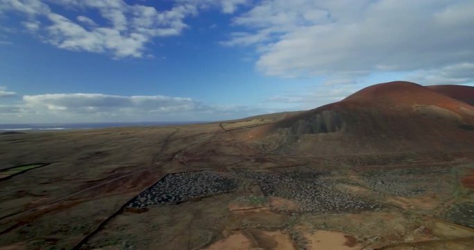 Aereal paning view of volcanic mountain in majanicho fueteventura