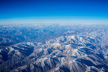 Obraz premium Aerial Mountain view from airplane