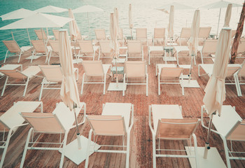 Overview of a beautiful solarium facing the sea on a hot summer day
