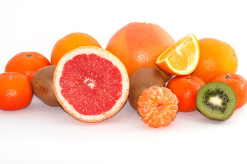 Assortment of exotic fruit close up on a white background copy space for text