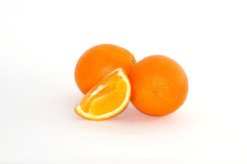 Orange on white background, juicy fruit slice close up