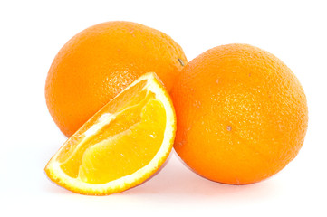 Orange on white background, juicy fruit slice close up