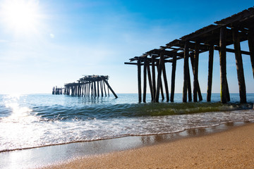 Sea view, blue sky, old wooden bridge, beautiful summer
