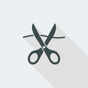 Scissors cutting thread