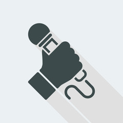 Hand holding microphone