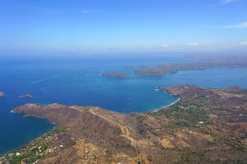 Fototapeta na wymiar Aerial view of the Golfo del Papagayo with the Peninsula Papagayo near Liberia, Guanacaste, Costa Rica, during the dry season