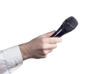 Man's hand in a white shirt holding a microphone isolated on white background