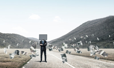 Businessman with TV instead of head.