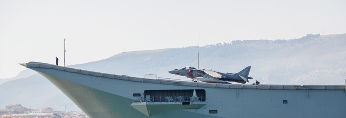 BILBAO, SPAIN - MARCH / 23/2019. The aircraft carrier of the Spanish Navy Juan Carlos I in the port of Bilbao, open day to visit the ship. Sunny day © Erlantz