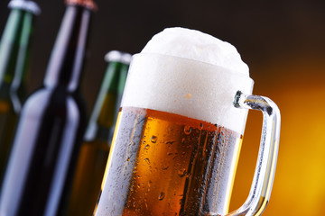 Composition with glass and bottles of beer