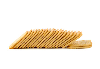 Crackers on a white background. Salty crackers close up on a white background.