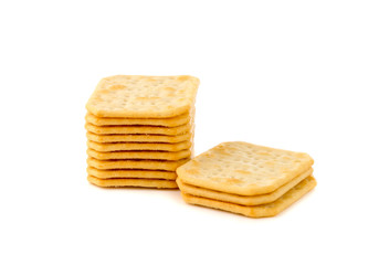 Crackers on a white background. Salty crackers close up on a white background.