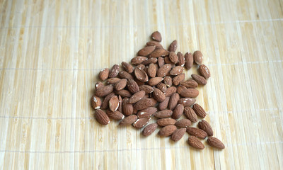 Fototapeta na wymiar Healthy food for background image close up almond nuts. Texture